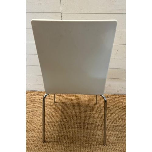 114 - Two white Italian Sintesi chairs on chrome legs