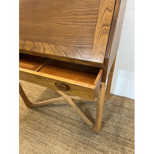 12 - An 1960's Ercol writing desk (H103cm W80cm D45cm)