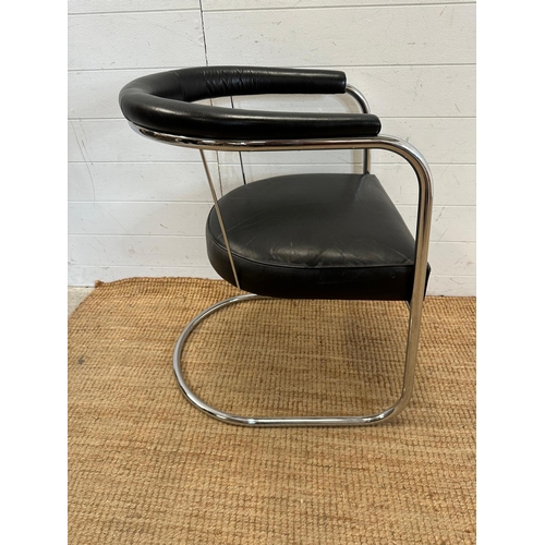 120 - A tubular chrome Bauhaus style chair in a faux black leather upholstery