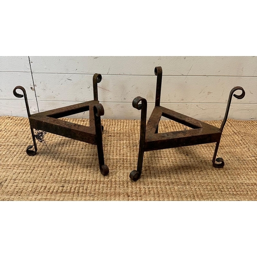 128 - A pair of wrought iron triangular plant stands