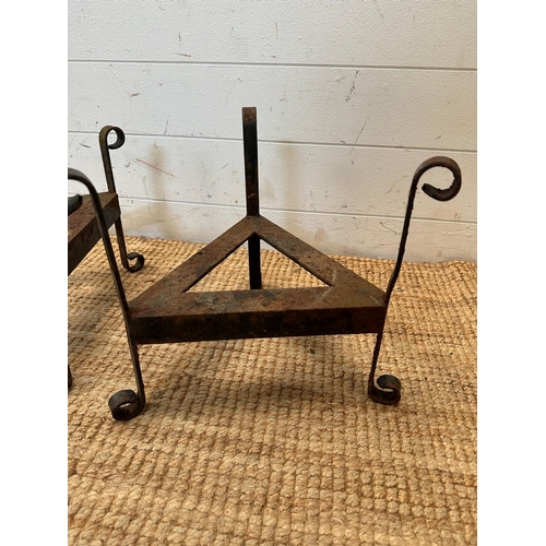 128 - A pair of wrought iron triangular plant stands