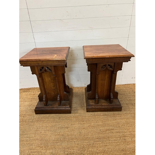 134 - A pair of gothic revival oak display pedestals