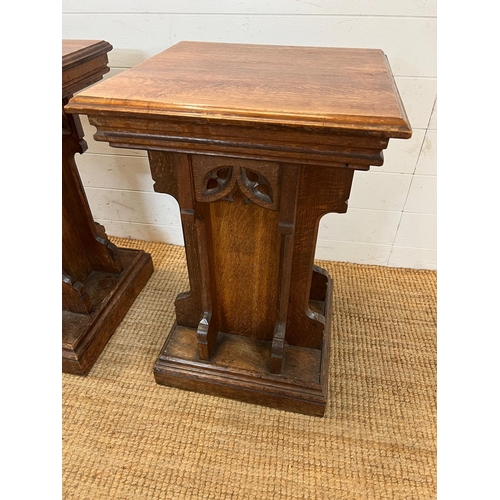 134 - A pair of gothic revival oak display pedestals