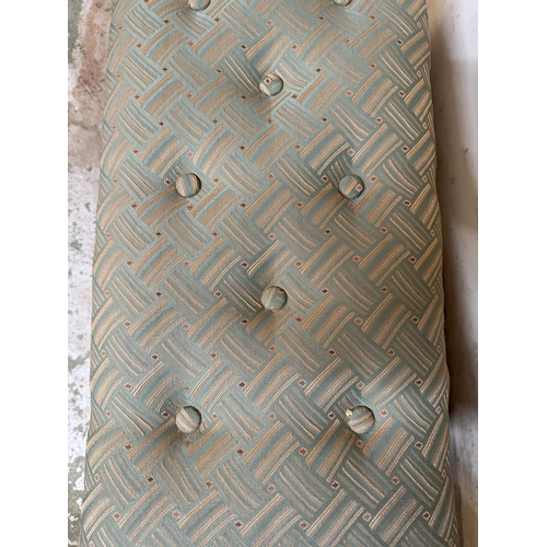139 - A button tufted green upholstered foot stool