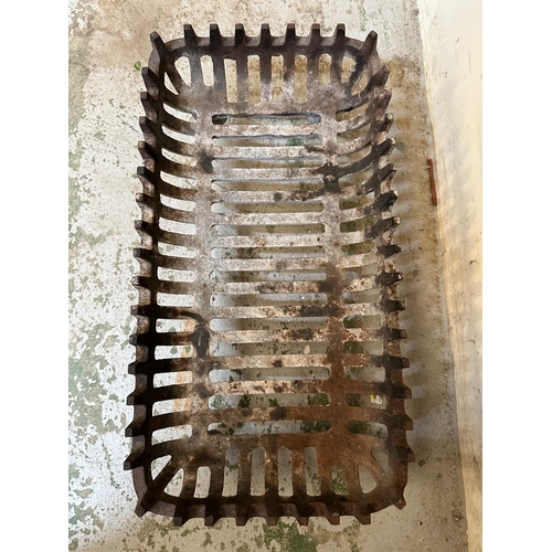 145 - A cast iron fire grate