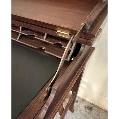 152 - A mahogany ladies desk or writing table with hinged lid opening to black leather writing surface and... 