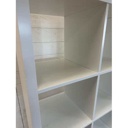 164 - A white Ikea eight compartment storage unit (H147cm W77cm D39cm)