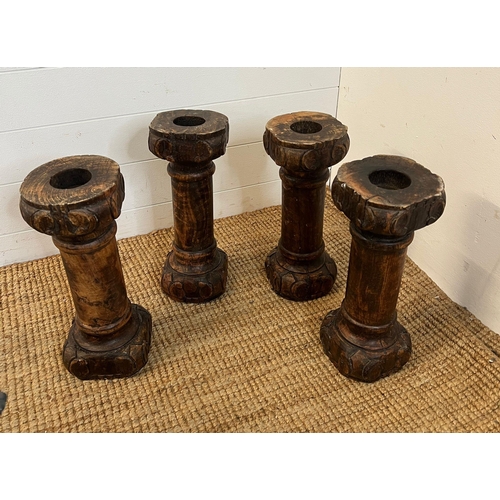 17 - Four rustic wooden plinth candle holders H40cm
