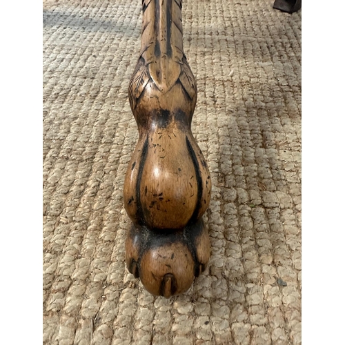 170 - A pedestal tilt top bird cage table in the Georgian style on carved tripod legs featuring eagle head... 