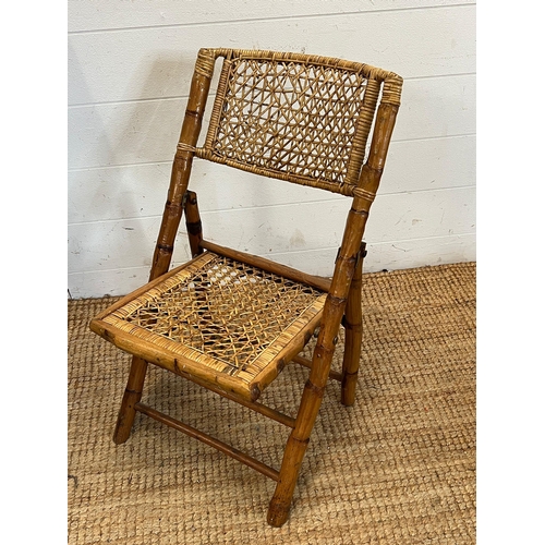 18 - A folding vintage bamboo and wicker chair