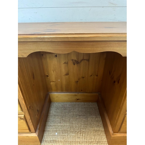22 - A pine dressing table flanked on both side with three drawers either side (D44cm W154cm H76cm)