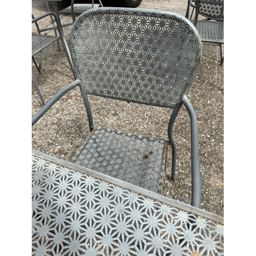 240 - A metal starburst garden table and two chairs (H73cm SQ70cm)