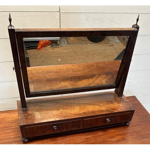 28 - A mahogany dressing table or toilet mirror with two drawers under on bun feet