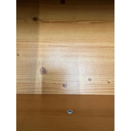 29 - A pine three drawer bedside (H67cm SQ48cm)