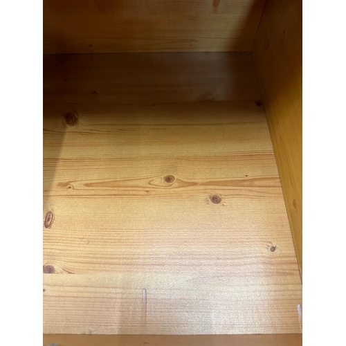 29 - A pine three drawer bedside (H67cm SQ48cm)