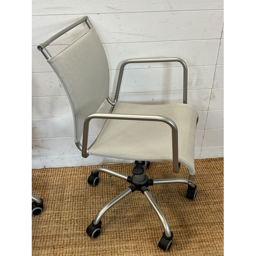 36 - Two chrome office chairs on castors