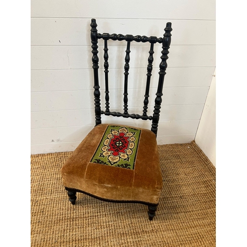 37 - An Elm parlour chair with needlework seat pad