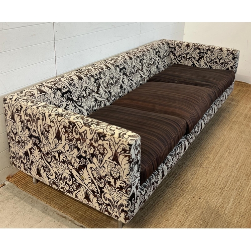40 - Three seater sofa with pattern fabric and brown cushion seat pads by MOOOI (H60cm W220cm D86cm SH44c... 