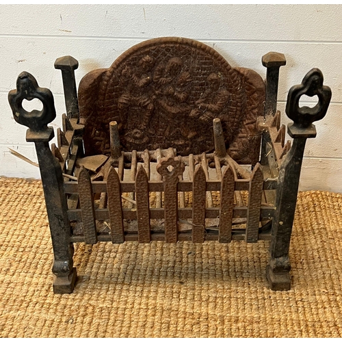 58 - A cast iron fire grate (H42cm W43cm D25cm)