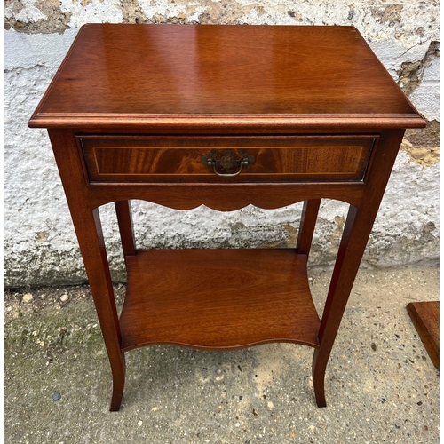 67 - A side table with drawer centre on out swept legs (H68cm W44cm D30cm)