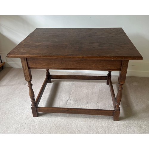 73 - An oak side table with turned legs (H50cm W70cm D53cm)