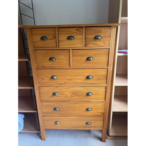 75 - A multi drawer pine chest (H141cm W90cm D53cm)