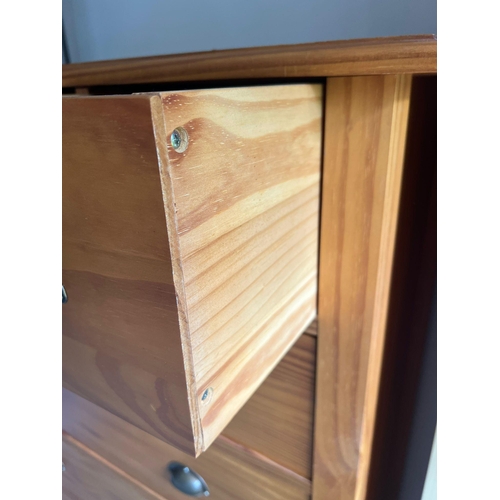 75 - A multi drawer pine chest (H141cm W90cm D53cm)