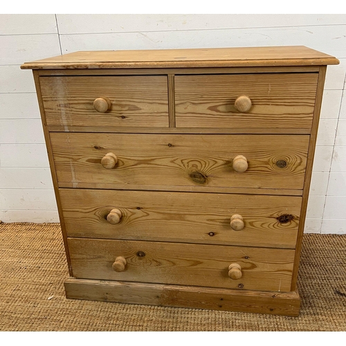 8 - A pine chest of drawers, two over three (H92cm W90cm D45cm)