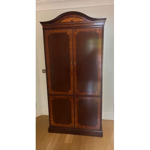 80 - A Regency style display cabinet with panelled doors opening to glass shelves and lights (H217cm W104... 