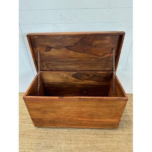 85 - A contemporary hardwood trunk or storage box (H50cm W96cm D48cm)