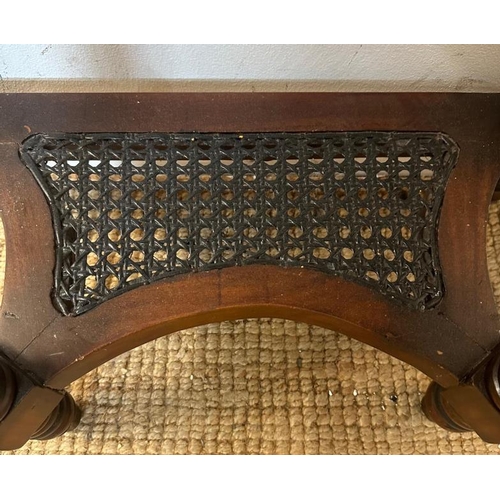 21 - A Demi Lune side table with fluted legs and cane shelf under