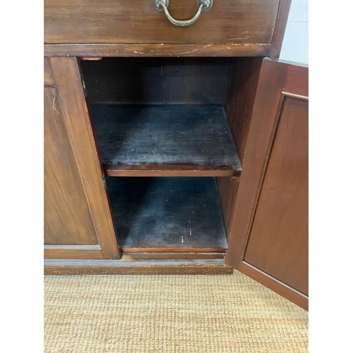 26 - A glazed display unit upon a cabinet base with panelled doors (H174cm W81cm D50cm)