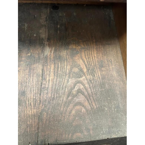 3 - A dark oak mule chest with carved panels and drawers, hinged lid opening to storage with two drawers... 