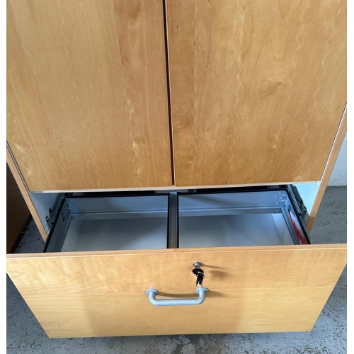 32 - A contemporary office cabinet, two doors opening to four shelves and a filing cabinet to bottom (H12... 