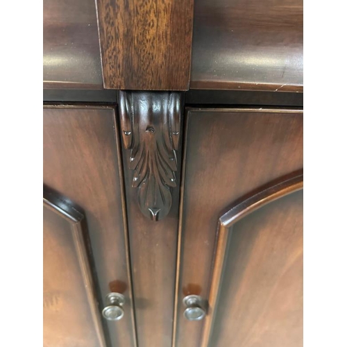 37 - A mahogany sideboard comprising of three drawers and three cupboards under (H92cm W163cm D47cm)