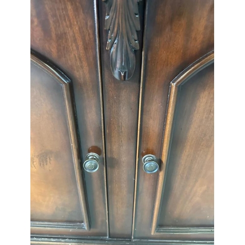 37 - A mahogany sideboard comprising of three drawers and three cupboards under (H92cm W163cm D47cm)