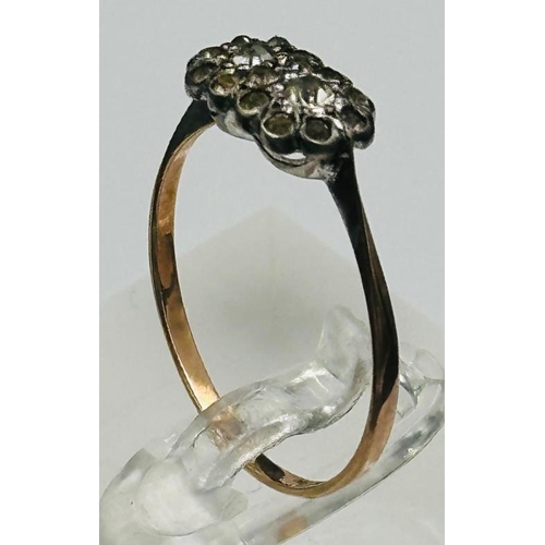 499 - A 9ct yellow gold and silver diamond ring.