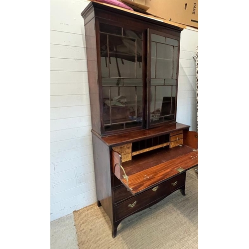 50 - George III style secretaire bookcase, secretaire chest has a fitted top drawer and three drawers bel... 