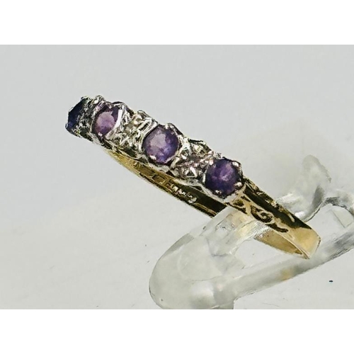 524 - A 9ct gold amethyst and diamond style ring approximate weight 1.8g.