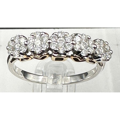 571 - A five stone diamond ring set in platinum