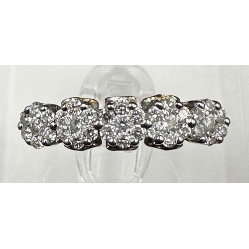 571 - A five stone diamond ring set in platinum