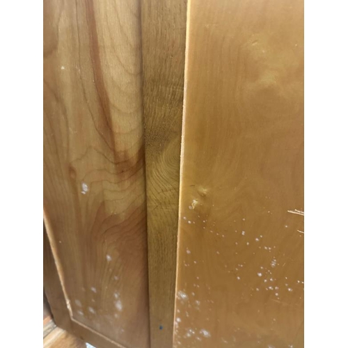 9 - A large arts and crafts pine kitchen storage cupboard, two over two door cupboards with a total of f... 