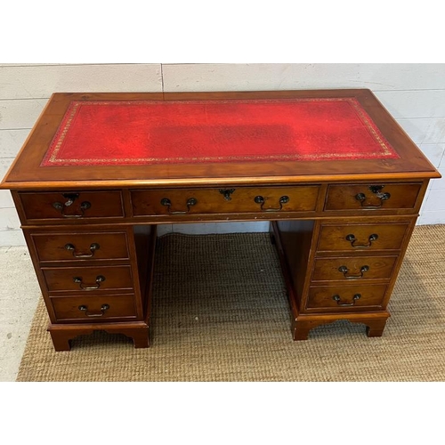 13 - A pedestal desk with ed leather top (H75cm W120cm D60cm)