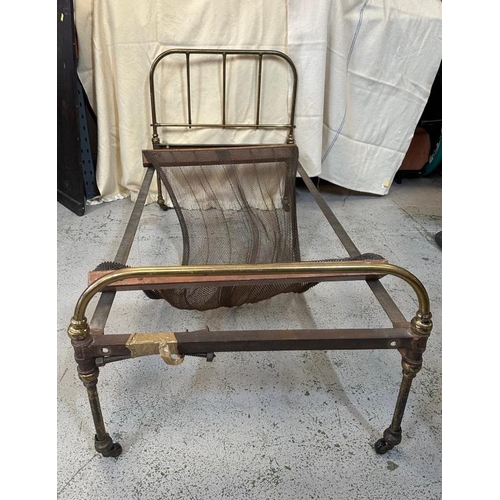 109 - A Victorian brass single bed with original wire mesh base and three original bolts with one other