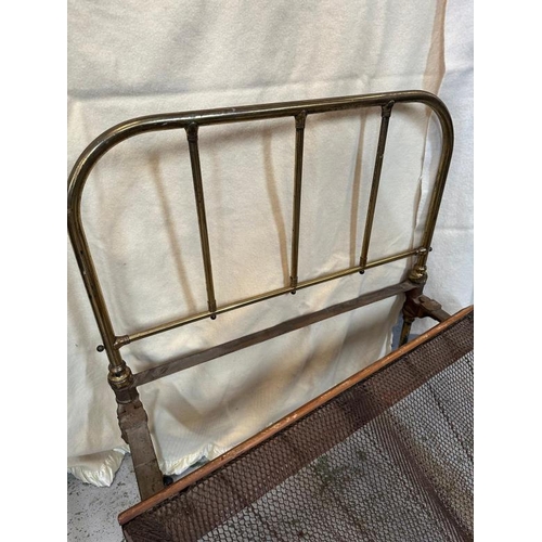 109 - A Victorian brass single bed with original wire mesh base and three original bolts with one other