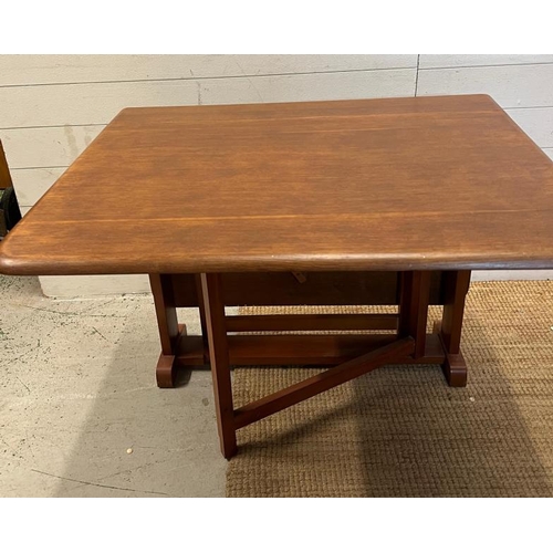 12 - A Mid Century drop leaf dining table (H74cm W123cm)