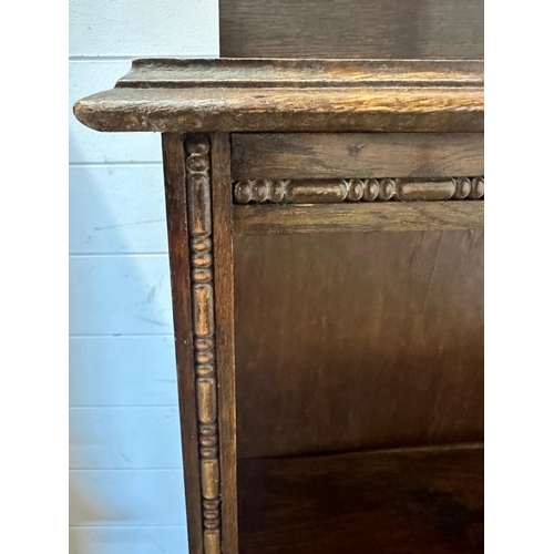 120 - An oak 19th century open bookcase with two adjustable shelves and galleried top. Height 126, 24x91