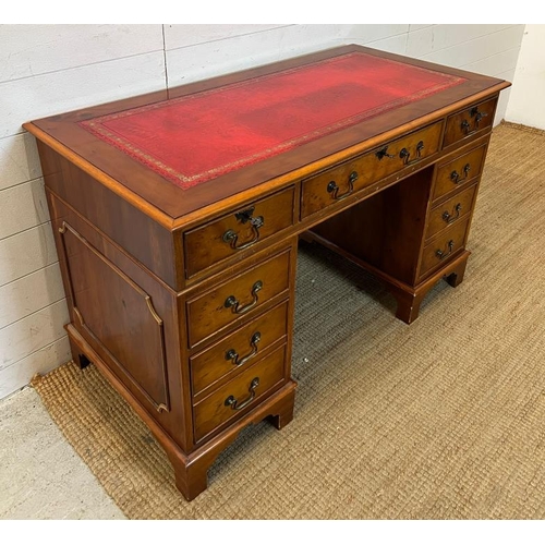 13 - A pedestal desk with ed leather top (H75cm W120cm D60cm)