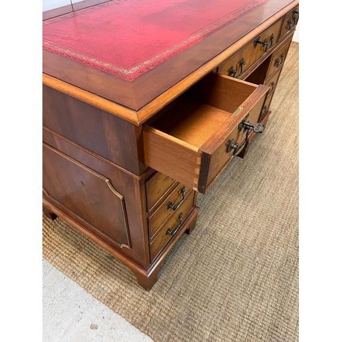 13 - A pedestal desk with ed leather top (H75cm W120cm D60cm)