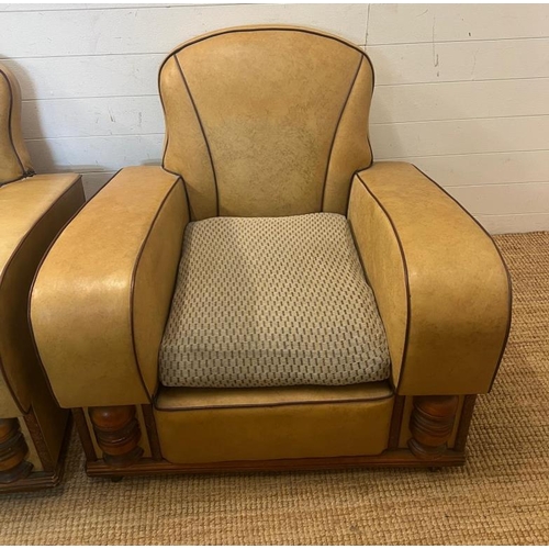 133 - A pair of Art Deco club chairs, beige with red piping